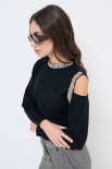 MAGLIA CUT OUT CON STRASS NERO