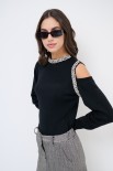 MAGLIA CUT OUT CON STRASS NERO