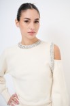 MAGLIA CUT OUT CON STRASS PANNA