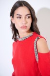 MAGLIA CUT OUT CON STRASS ROSSO