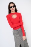 MAGLIA SCOLLO CON BUCO E STRASS ROSSO