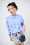 CAMICIA CON TASCHE CELESTE