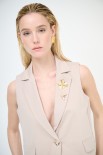 GILET CROP CON SPILLE BEIGE