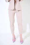 PANTALONE STRETTO CON ELASTICO DIETRO BEIGE