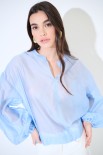 BLUSA SCOLLO V VOILE CON MANICA AMPIA ELASTICO CELESTE