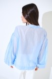 BLUSA SCOLLO V VOILE CON MANICA AMPIA ELASTICO CELESTE