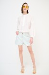 SHORTS CON RISVOLTO CREMA