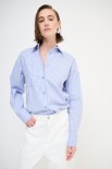 CAMICIA OVER CON TASCA RIGA JEANS