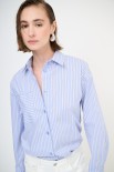 CAMICIA OVER CON TASCA RIGA JEANS