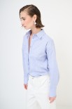 CAMICIA OVER CON TASCA RIGA JEANS