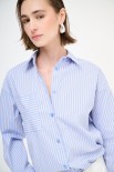 CAMICIA OVER CON TASCA RIGA JEANS