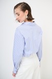 CAMICIA OVER CON TASCA RIGA JEANS