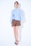 BLUSA CON FIOCCO DIETRO CELESTE