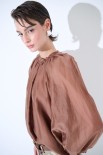 BLUSA CON FIOCCO DIETRO MORO