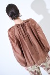 BLUSA CON FIOCCO DIETRO MORO