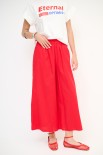 PANTALONE CROP CON ELASTICO ROSSO