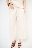 PANTALONE CARROT CON TASCA NELLA CUCITURA BURRO