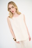 TOP SMANICATO CON BOTTONI DIETRO BURRO