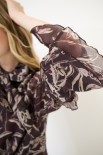BLUSA COLLO CON FIOCCO E MANICHE A BALZA MORO