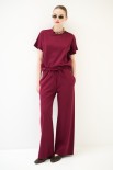 PANTALONE LARGO CON ELASTICO VITA TESSUTO DIAGONALE VINO