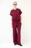 PANTALONE LARGO CON ELASTICO VITA TESSUTO DIAGONALE VINO