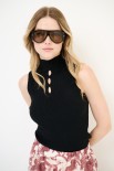 TOP SMANICATO COSTINA CON BUCHI NERO