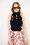TOP SMANICATO COSTINA CON BUCHI NERO