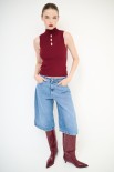 TOP SMANICATO COSTINA CON BUCHI BORDEAUX