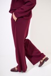 PANTALONE CON COULISSE IN TESSUTO VINO