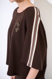 BLUSA OVER CON BANDE + SPILLA MORO