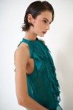 TOP CON VOLANT VERDE