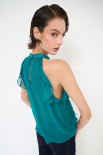 TOP CON VOLANT VERDE