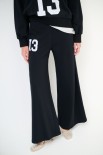 PANTALONE FELPA CON STAMPA SOTTO TASCA NERO