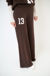 PANTALONE FELPA CON STAMPA SOTTO TASCA MORO