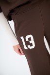 PANTALONE FELPA CON STAMPA SOTTO TASCA MORO