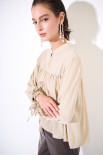 BLUSA CON BRACCIALI MANICHE BEIGE