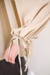 BLUSA CON BRACCIALI MANICHE BEIGE