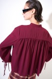 BLUSA CON BRACCIALI MANICHE VINO