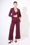 PANTALONE CON BANDA PASSAMANERIA LATERALE A CONTRASTO VINO