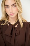 BLUSA CON FIOCCO MORO