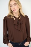 BLUSA CON FIOCCO MORO