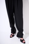 PANTALONE CON PINCE E BOTTONE FONDO NERO
