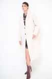 CAPPOTTO LUNGO CON FRANGE DIETRO BURRO