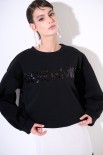 FELPA GARZATA CON SPACCHI SCRITTA PAILLETTES NERO