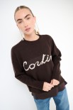 MAGLIA PARICOLLO OVER SCRITTA INTARSIO CORTINA MORO